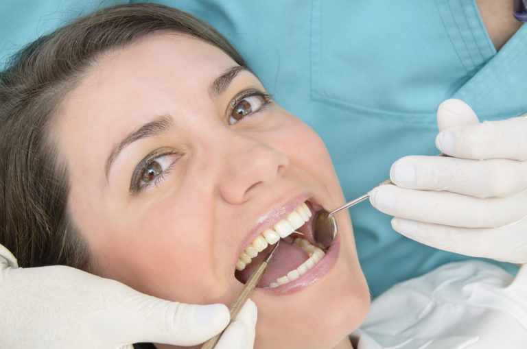 Smiling woman in dental chair